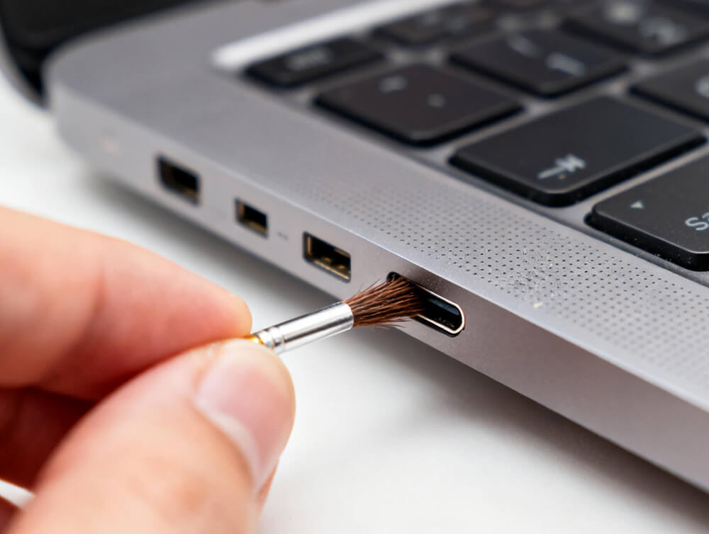Clean the USB C port with a brush